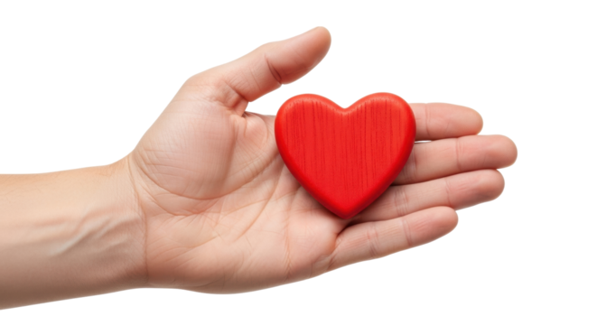 Isolated hand offering red wooden heart representing love, health, and charitable giving
