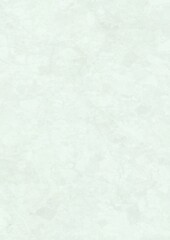 A close-up view of a textured light gray surface with subtle variations in tone and pattern.