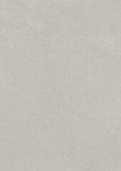 Close-up view of a smooth, light-colored stone surface with subtle natural veining and texture.