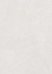 Close-up of a plain white textured surface with subtle fabric-like patterns and faint creases.