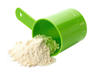 Green measuring scoop filled with light beige powder