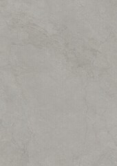 Close-up view of a smooth gray textured surface with subtle variations in tone and faint patterns.