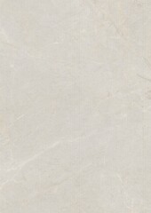 Close-up of a smooth, light-colored stone surface with subtle natural veining and texture.