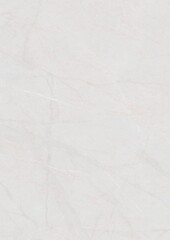 Close-up of a smooth, light-colored marble surface with subtle veining patterns