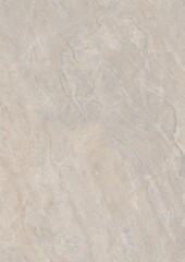Close-up view of a light beige marble surface with subtle veining patterns