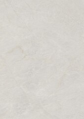 Close-up of a textured white surface with subtle imperfections and faint markings