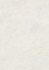 Close-up of textured white paper surface with subtle fibers and natural imperfections