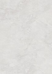 Close-up of a textured light gray surface with subtle marbled patterns