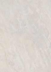 Close-up of a light-colored textured surface with subtle patterns and faint markings