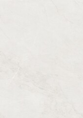 Close-up of a smooth, light gray marble surface with subtle veining patterns