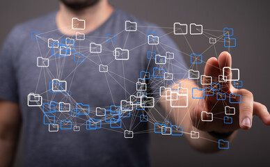 Abstract image depicting a person interacting with a network of digital files, showcasing data management and connectivity.