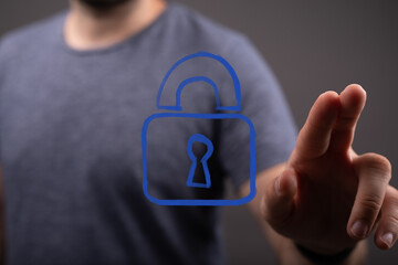 Hand reaching for a digital padlock.  Cybersecurity, data privacy, safety, protection.