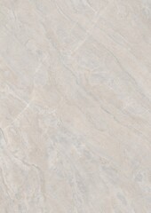 Close-up of light-colored marble surface with natural veining patterns