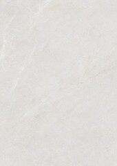 Close-up of a smooth, light gray surface with subtle texture and faint scratches