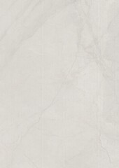 Close-up of light gray marble surface with natural veining patterns