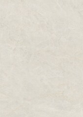 Close-up of a textured light gray surface with subtle variations in tone and pattern