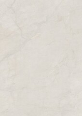 Close-up of a light-colored marble surface with natural veining patterns
