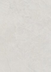Close-up of a textured white surface with subtle patterns and faint lines