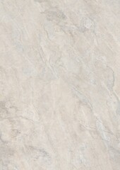 Close-up view of a light beige marble surface with subtle veining patterns
