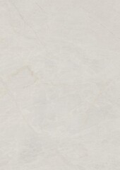 Close-up of a plain white textured surface with subtle imperfections