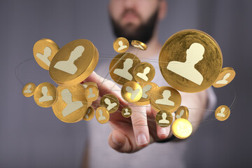 Hand interacting with a digital interface showing networked people. Business and technology concept of global human connection and social media.