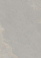 Close-up view of a textured gray surface with subtle natural patterns and faint discoloration