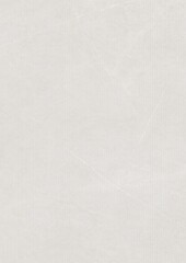 Close-up of a plain textured white surface with subtle vertical lines and faint creases