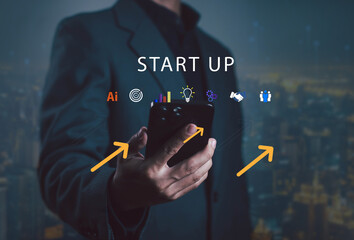 Entrepreneur holding smartphone with startup and growth icons, symbolizing innovation, technology,...