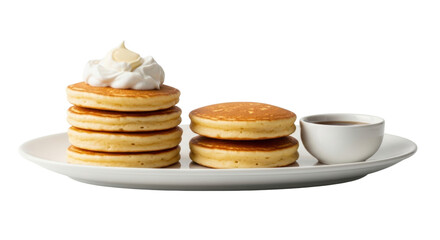 Isolated breakfast meal plate with pancakes, whipped cream, and coffee or syrup cup