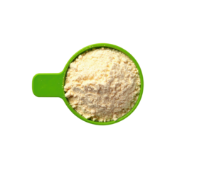 Pale yellow powder in a green measuring cup
