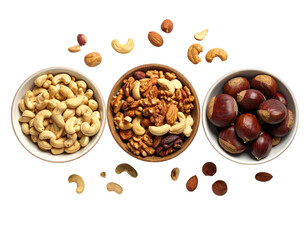 Three bowls of assorted nuts, top-down view