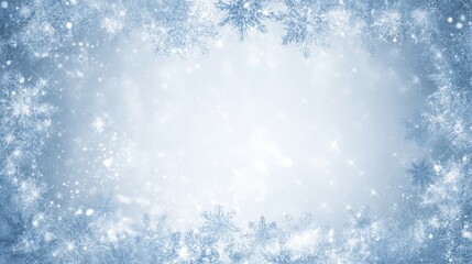 Elegant winter background with sparkling snowflakes and frosty blue design