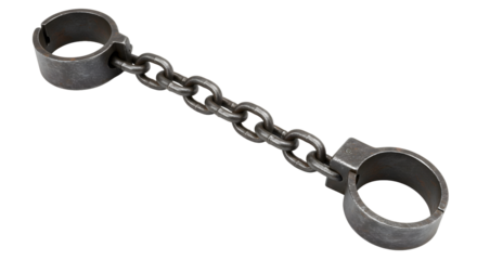 Heavy antique iron shackles and chain symbolizing restriction historical captivity and struggle for freedom