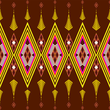 Abstract seamless tribal geometric pattern featuring diamond shapes, bold yellow lines, and pink accents on a brown background. Perfect for textile, wallpaper, wrapping paper, and digital design.