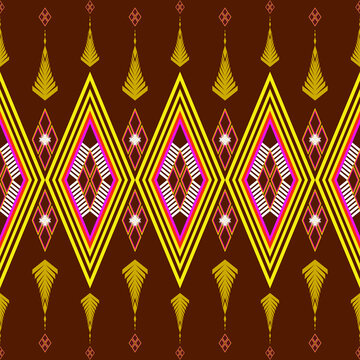 Abstract seamless tribal geometric pattern featuring diamond shapes, bold yellow lines, and pink accents on a brown background. Perfect for textile, wallpaper, wrapping paper, and digital design.