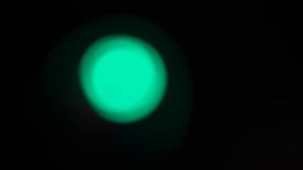 green light on a black background,light leaks overlay effect with blurry green light leaks,retro film distressed grain noisy texture light leak flare on black background,green gradient shape