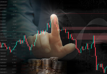 Market analysis shows a hand pointing at cryptocurrency price movements with digital charts in the background