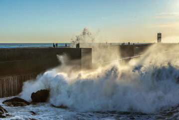 View from breakwater on Atlantic Ocean waves in Foz do Douro area of Porto city, Portugal