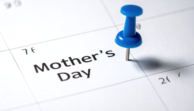 A blue thumbtack marks "Mother's Day" on a calendar
