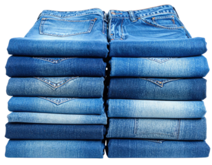 Stacked pairs of folded blue jeans in various shades