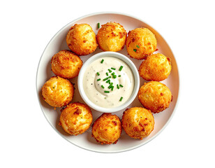 Crispy, golden-brown cheese balls arranged around a white dipping sauce
