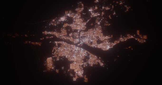 Khartoum and Omdurman (Sudan) top view at night. View on modern city from satellite. Camera is zooming in, rotating counterclockwise. Vertical video. The north is on the left side