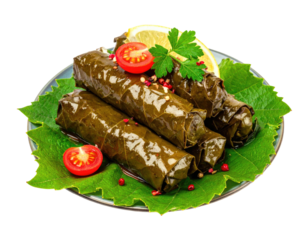 Grape leaves filled with savory meat, served on a plate of grape leaves