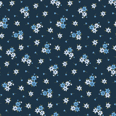 Cute floral pattern. Seamless vector pattern. Elegant template for fashion prints. Small light blue flowers. Dark blue background. Summer and spring motifs. Stock vector