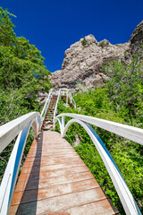 wooden stairs and passageways on hiking route in mountains
