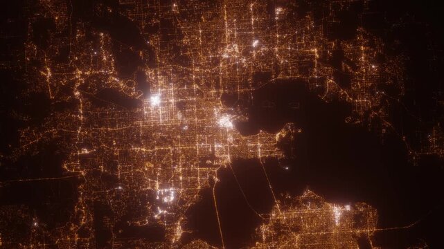Tampa (Florida, USA) top view at night. View on modern city from satellite. Camera is zooming in, rotating counterclockwise. Vertical video. The north is on the left side