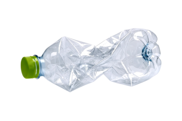 Crushed clear plastic water bottle with green cap isolated on transparent background