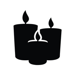 Silhouette of three candles burning with flames, symbolizing peace and remembrance