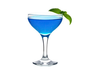Vibrant blue cocktail in a coupe glass, garnished with basil leaf