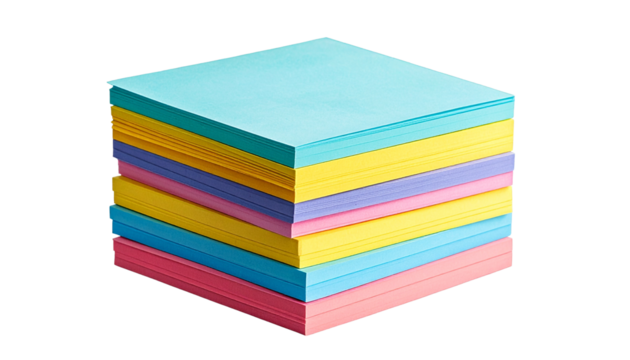 Stack of colorful sticky note pads, books, and plastic blocks isolated on white background